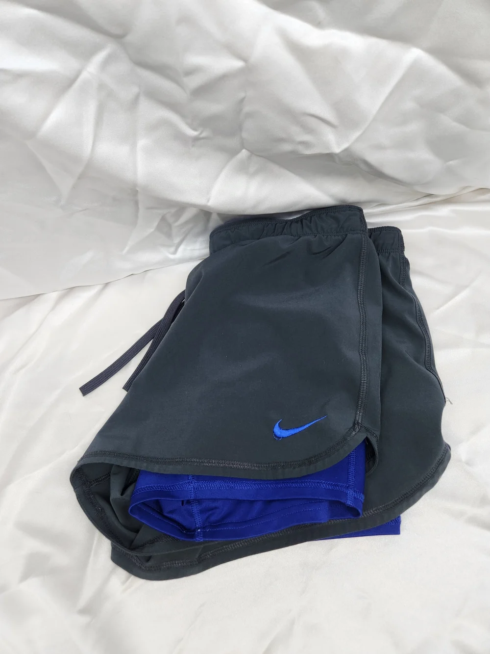Nike Black Running Shorts with Blue Accent
